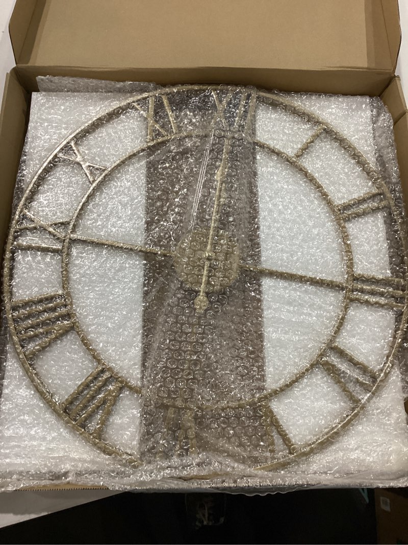Condition photo showing New/Like New for Large Wall Clock 19 Inch Gold Roman Numerals Metal Clock Battery Operated Silent Non-Ticking Decor Clock Modern Round Oversize Wall Clocks for Home, Hotel, Office, Bedroom (Gold, 19inch)