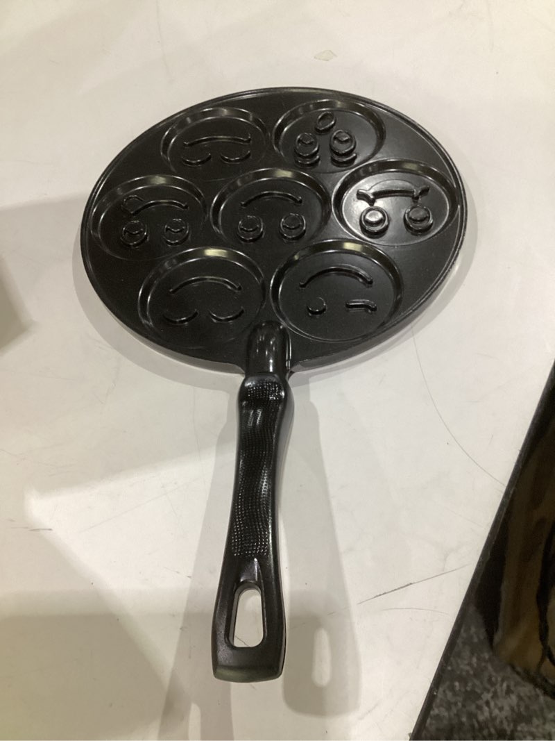 Condition photo showing Good Condition for nordic ware smiley face pancake pan silver, 10 1/2 inch diameter