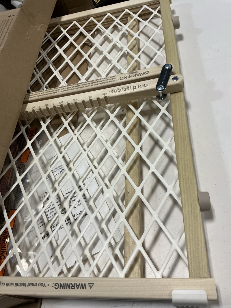 Condition photo showing Good Condition for toddleroo by north states diamond mesh wooden baby gate: 26.5"- 42" wide. pressure mounted baby gate for doorway. (23" tall, sustainable hardwood)