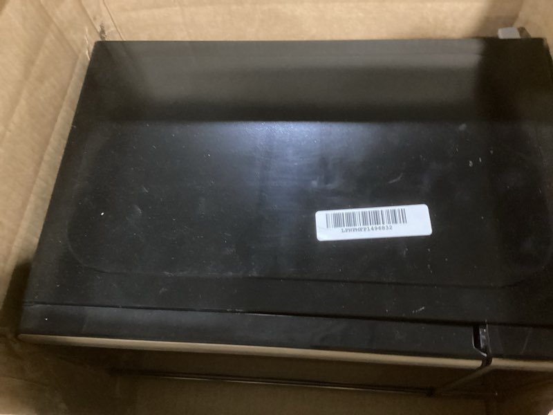 Condition photo showing As Is for BLACK+DECKER EM720CB7 Digital Microwave Oven with Turntable Push-Button Door, Child Safety Lock, 700W, Stainless Steel, 0.7 Cu.ft 0.7 cu. ft.