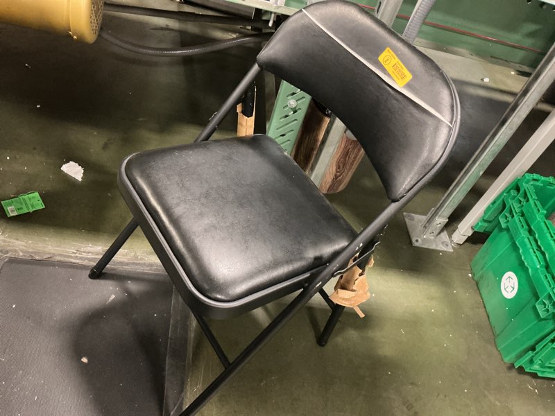 Condition photo showing As Is for Black folding metal chair 