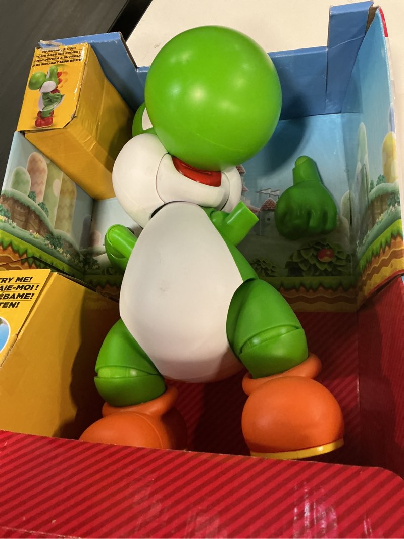 Condition photo showing As Is for nintendo super mario "let's go, yoshi!" yoshi figure