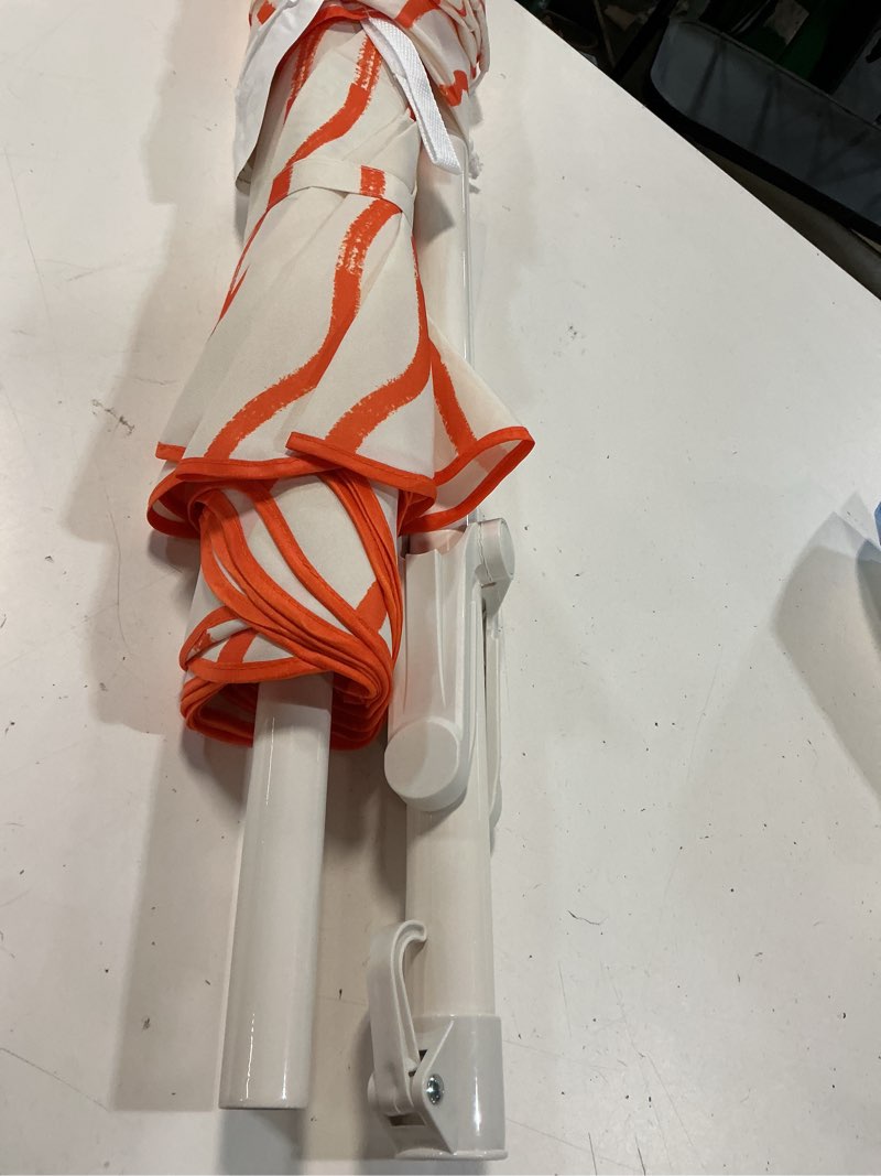 Condition photo showing New/Like New for 6' round outdoor patio striped beach umbrella orange - room essentials ?