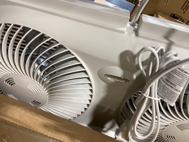 Condition photo showing Good Condition for bionaire window fan with reversible airflow blades – 3-speed settings, programmable thermostat, led display, remote control, fits 24–36" windows, no assembly required white 2 blades electronic control with lcd screen window fan