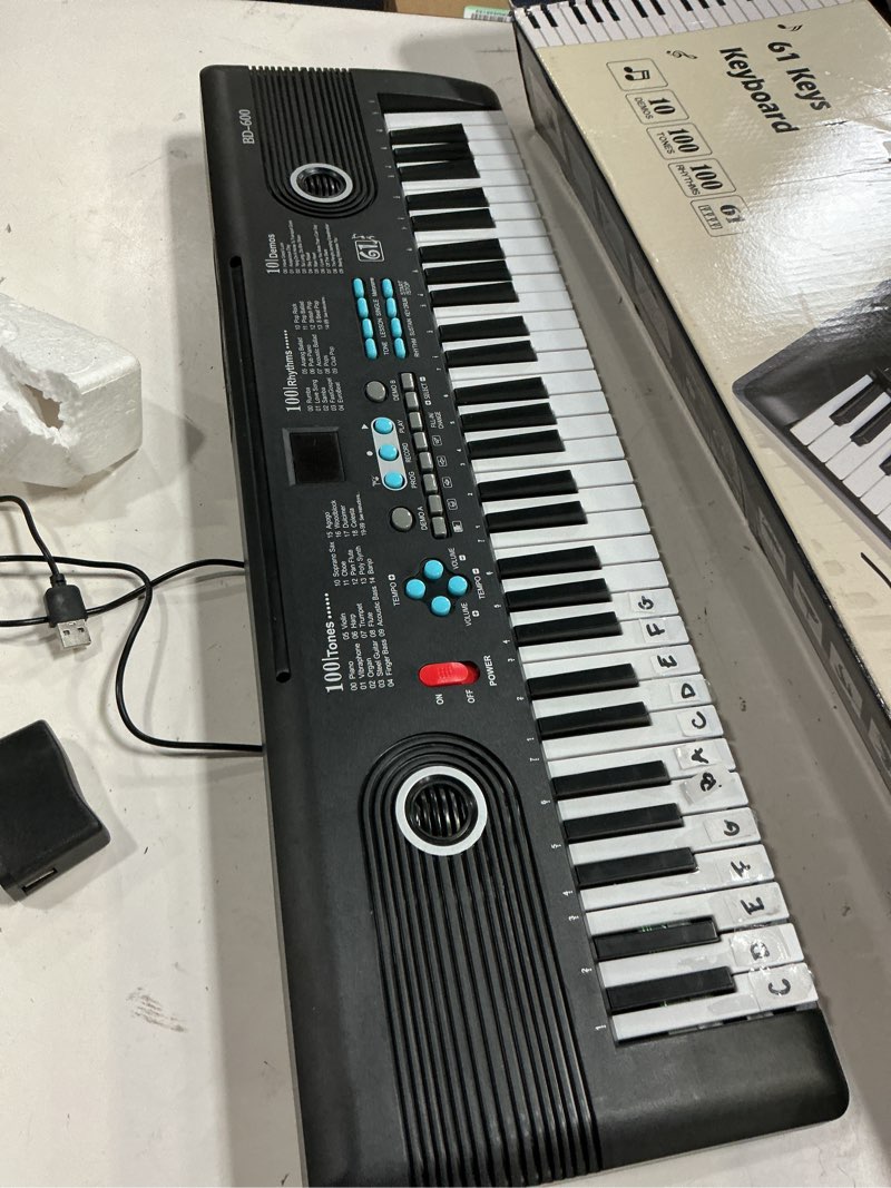 Condition photo showing As Is for (missing microphone )61 key keyboard piano,portable electronic digital piano,built in dual speakers,external microphone,power plug,rich teaching content,multi-functional electronic piano suitable for beginners black