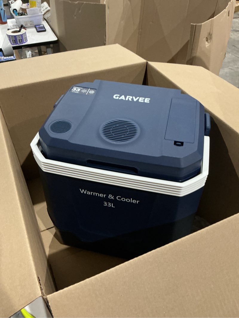 Condition photo showing Good Condition for garvee 35 quart (33 l) electric cooler & warmer, portable car refrigerator with automatic locking handle, 12v car cooler for vehicle & trucks, 110v ac home power cord, plug in coolers,blue