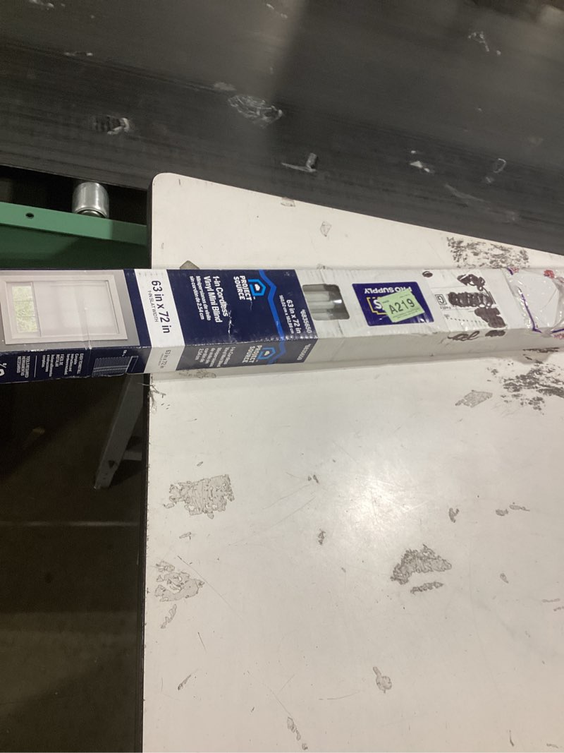Condition photo showing As Is for Project Source 1-in Slat Width 63-in x 72-in Cordless White Vinyl Light filtering Mini-blinds(Damaged)