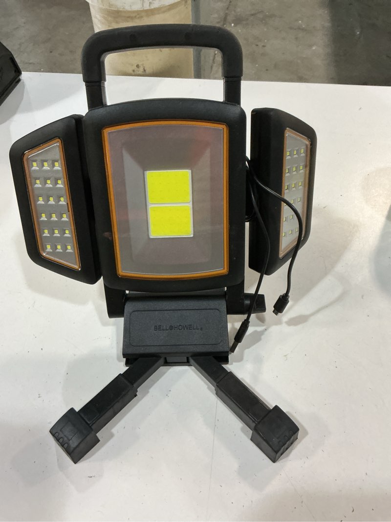 Condition photo showing As Is for tresda 30w rechargeable work light, 3000lm portable magnetic led work light, battery powered waterproof cordless jobsite light for garage, car repair, workshop, camping, father’s day dad gifts magnetic stand