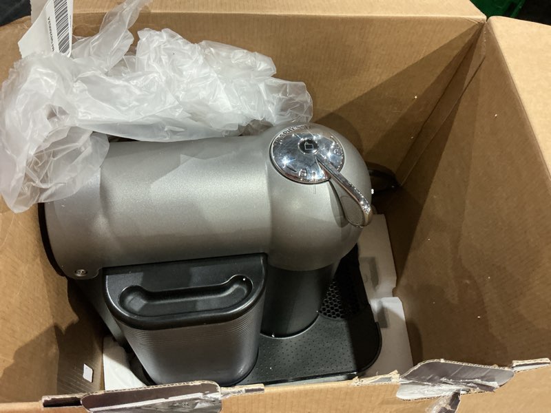 Condition photo showing As Is for nespresso vertuo coffee and espresso maker by breville, chrome machine chrome
