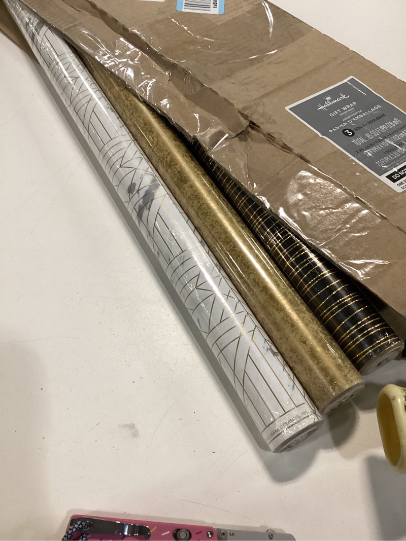 Condition photo showing New/Like New for Hallmark Premium Wrapping Paper Roll Bundle with Cut Lines on Reverse (3 Rolls: 85 sq. ft. ttl. Marble, Black, Antiqued Gold) for Valentines Day, Graduations, Birthdays, Weddings, and Bridal Showers Black and Gold