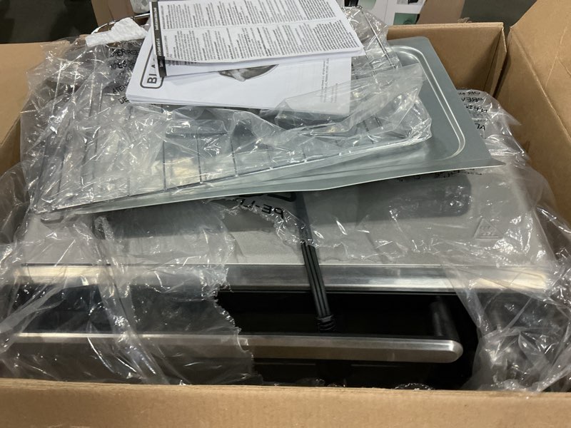 Condition photo showing As Is for black + decker crisp 'n bake pro 6-slice air fryer toaster oven with basket, pan, rack & tray, stainless steel