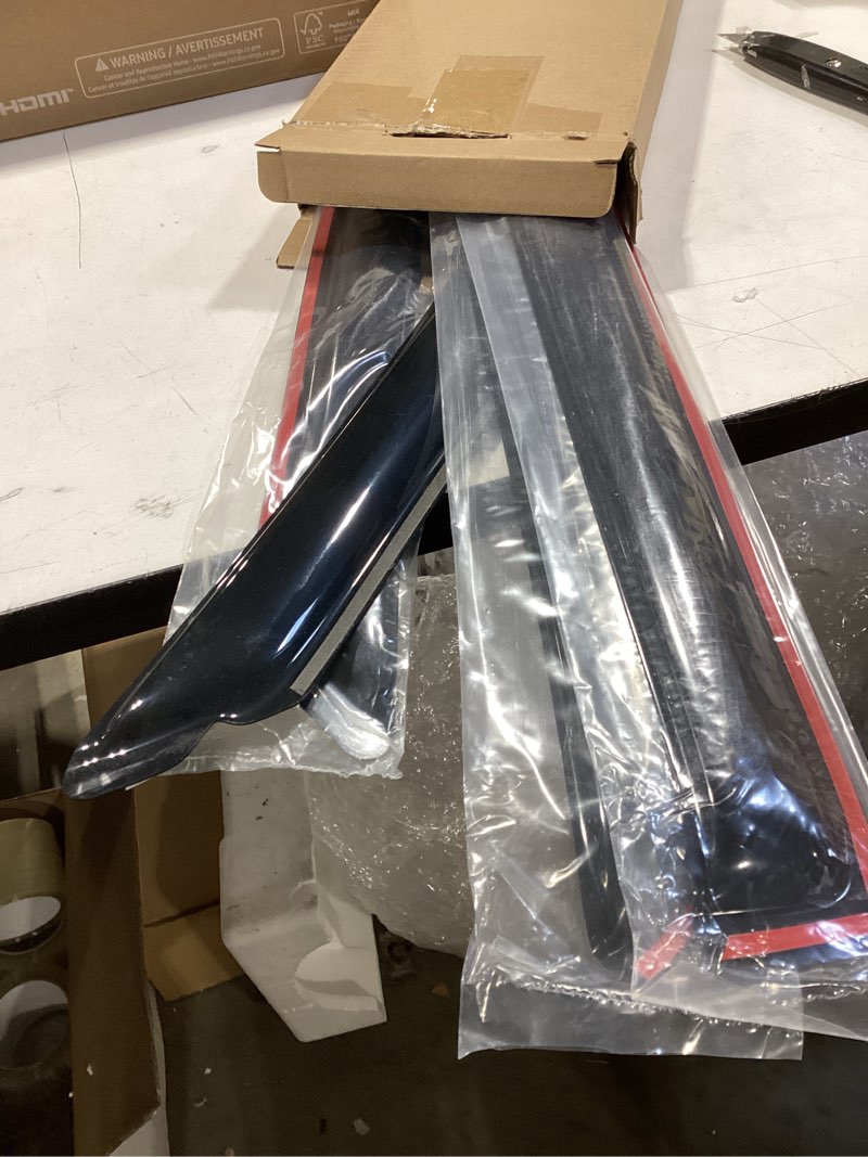 Condition photo showing As Is for Lightronic 194101 Extra Durable Clip-on In-Channel Auto Vent Window Visors, Fits 2009-2010 Dodge Ram 1500, 2011-2018 Ram 1500, 2019-2024 Ram 1500 Classic, Quad Cab, UV-Protect Rain Guard, Smoke, 4-Pcs