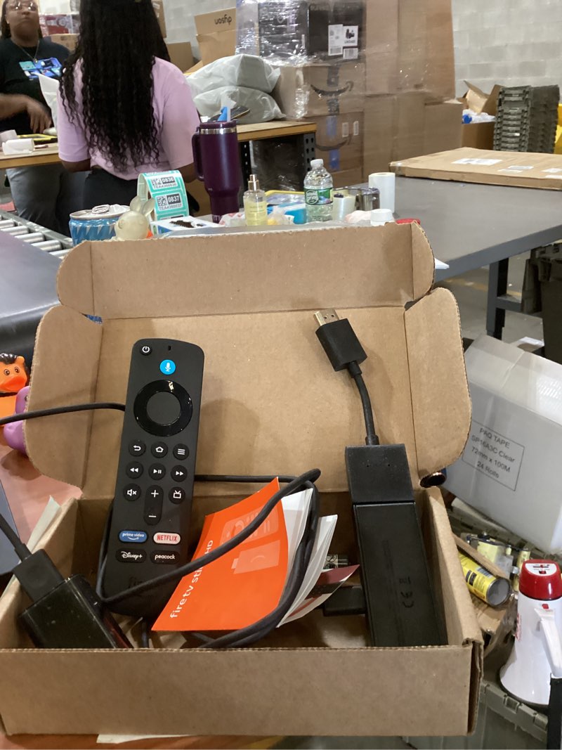 Condition photo showing As Is for amazon fire tv stick hd, free and live tv, alexa voice remote, smart home controls, hd streaming