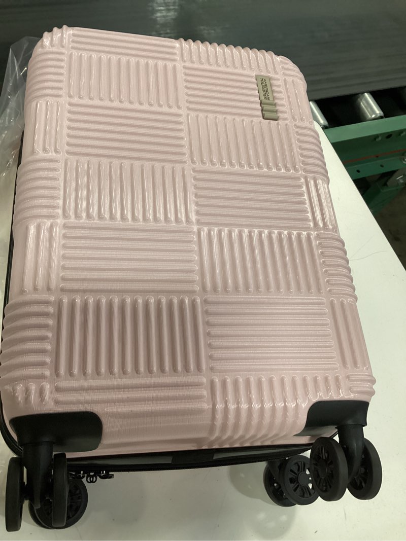 Condition photo showing New/Like New for american tourister nxt checkered hardside carry on spinner suitcase - pink
