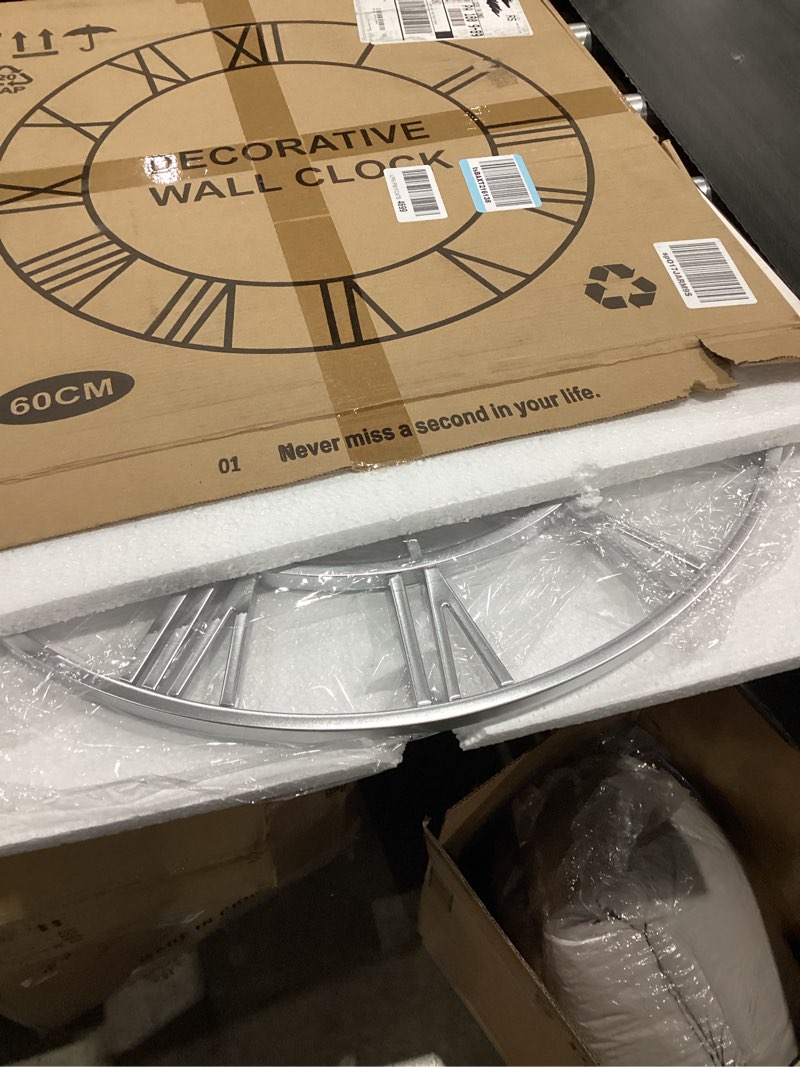 Condition photo showing Good Condition for LEIKE 24" Modern Large Wall Clocks,Vintage, Round,Silent Non Ticking,Battery Operated,Silver Metal Roman Numerals Clock for Living Room/Bedroom/Kitchen Decor 24 Inch Silver-roman Number