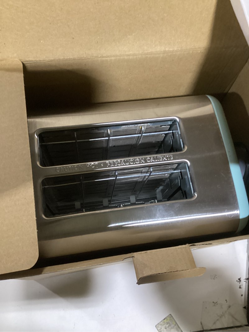 Condition photo showing Good Condition for bella 2 slice toaster, quick & even results every time, wide slots fit any size bread like bagels or texas toast, drop-down crumb tray for easy clean up, stainless steel and aqua