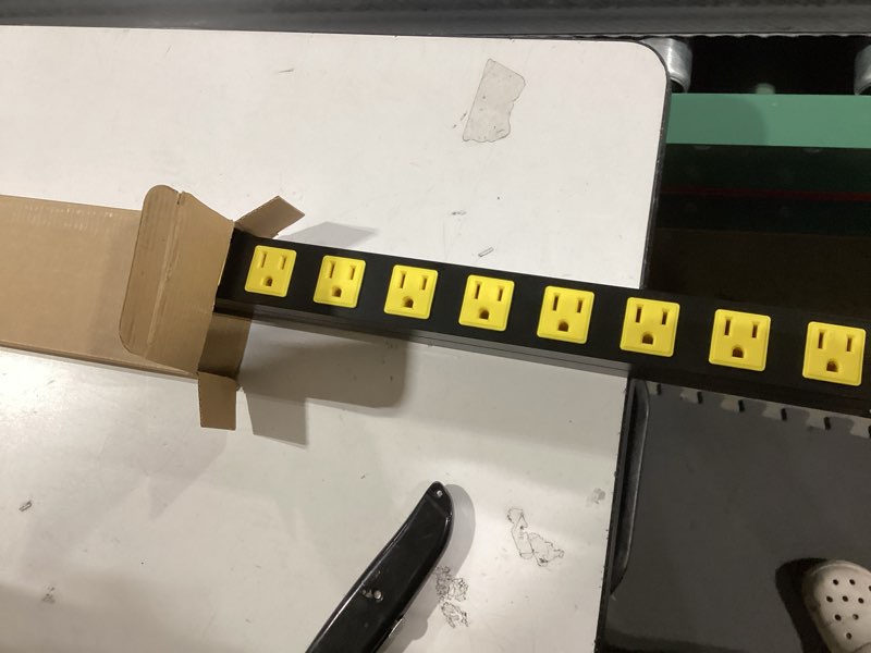 Condition photo showing Good Condition for 12 outlet long power strip, 3ft power cord, 2100 joules surge protector, wide spaced outlet power bar, overload protection switch, industrial heavy duty for work bench, shop, garage 12 outlet 3 ft