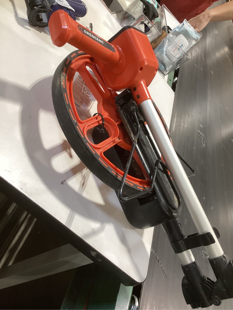 Condition photo showing As Is for crescent lufkin 12-in measuring wheel