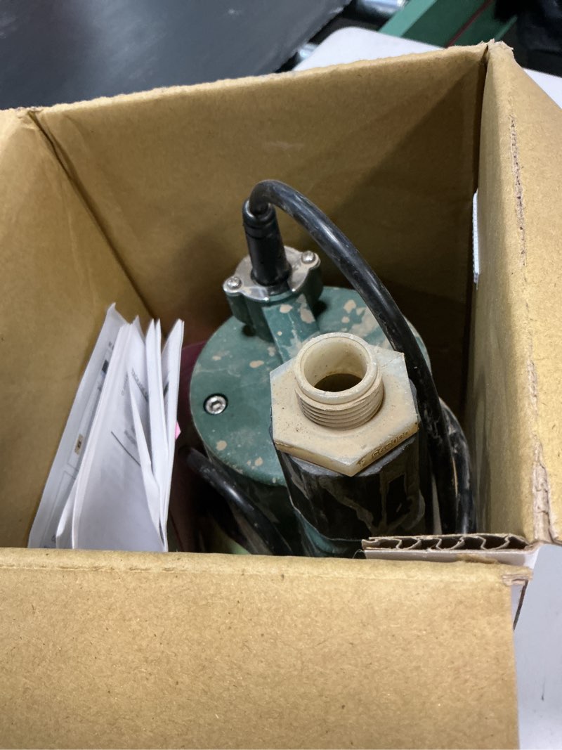 Condition photo showing As Is for zoeller 1/3 hp 2100 gph thermoplastic electronic switch bottom ac submersible utility pump