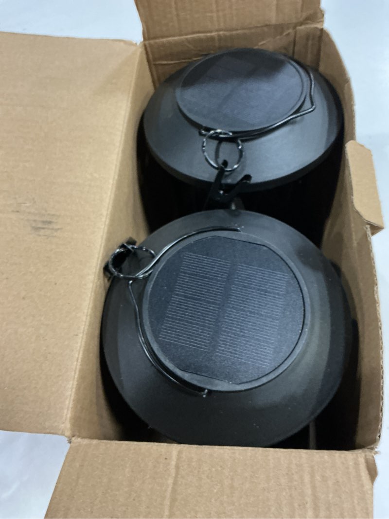 Condition photo showing Good Condition for WdtPro Solar Lanterns Outdoor Waterproof, Upgraded Bright Hanging Solar Lights for Outside,Solar Powered Lanterns Lighting LED for Garden Patio Yard Decorative 2 Pack (Warm Light) 2 PACK Classic Black