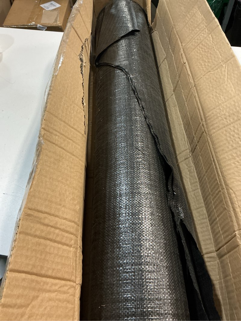 Condition photo showing As Is for heavy-duty landscape fabric or a weed barrier