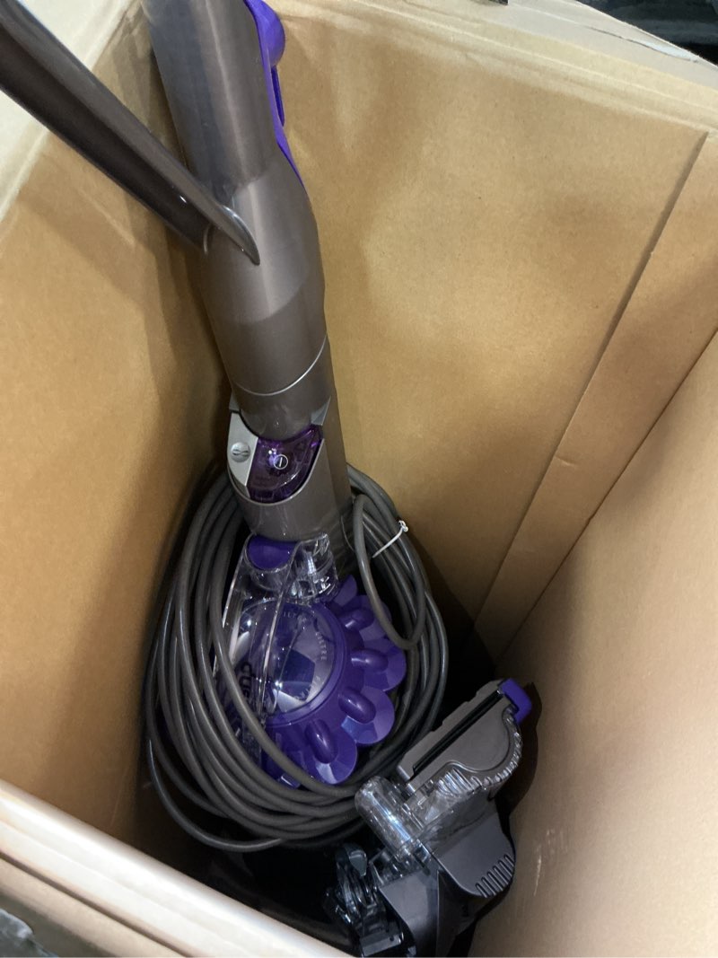 Condition photo showing As Is for dyson ball animal origin upright vacuum cleaner | purple | new