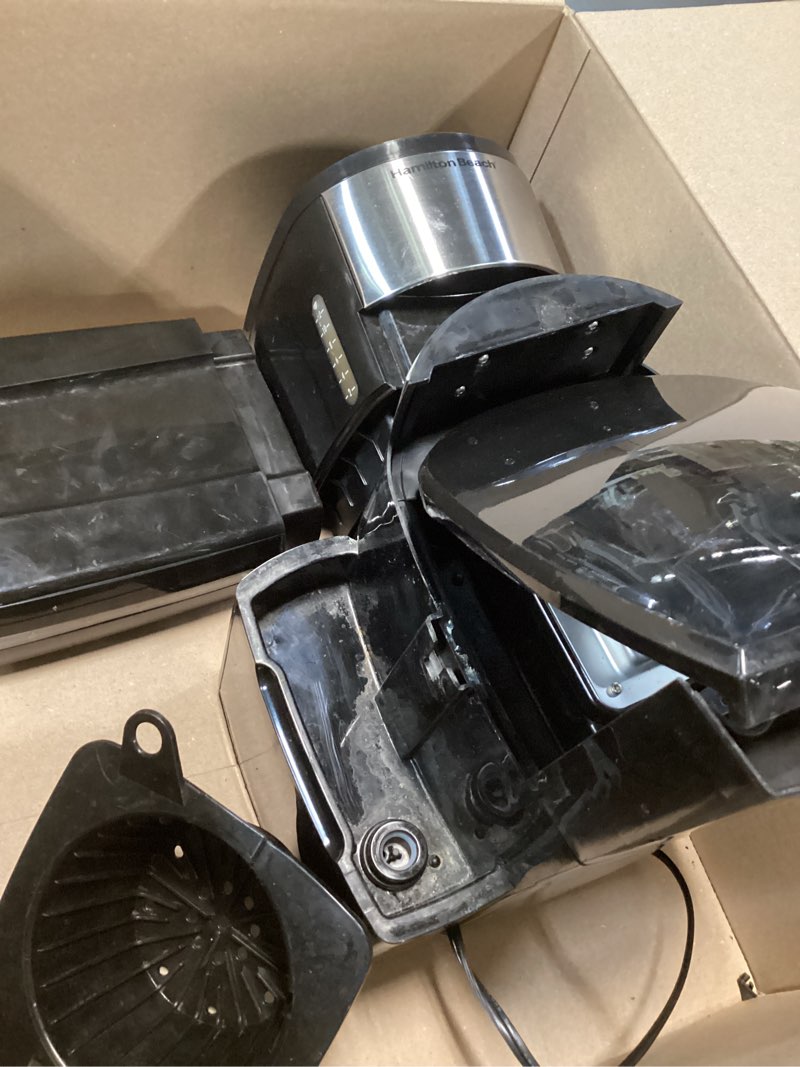 Condition photo showing item condition for Hamilton Beach One Press Programmable Dispensing 12 Cup Coffee Maker with Internal Coffee Pot, Stays Warm and Fresh for Hours, 60 oz. Removable Reservoir, Black & Stainless Steel (47950) Black and Silver