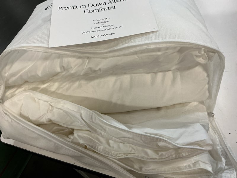 Condition photo showing As Is for quince premium down alternative comforter full/queen lightweight