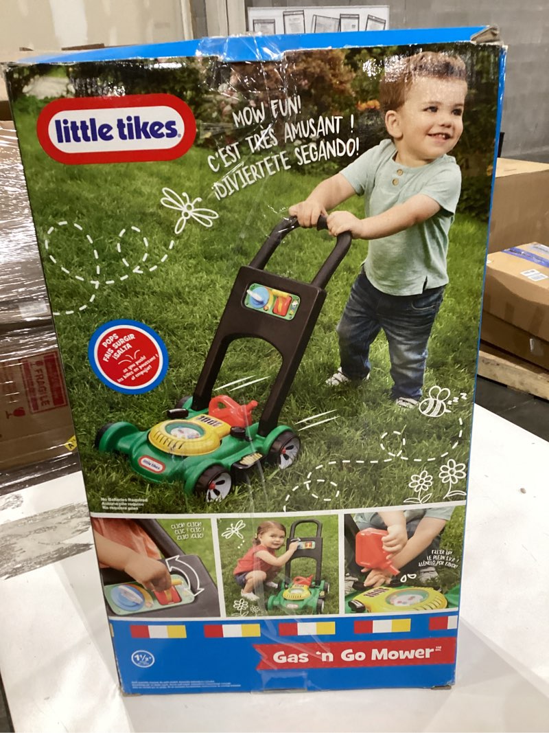 Condition photo showing Good Condition for little tikes lawn mower