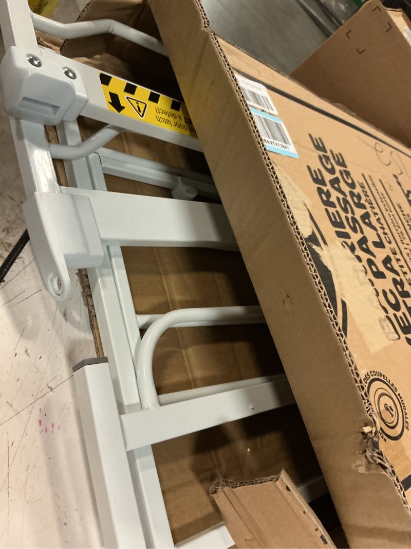 Condition photo showing Good Condition for carlson 29.5–36.5” extra wide dog gate with small pet door, walk-through pressure mounted metal indoor pet safety gate, tested and trusted by pet parents, american designed, american owned