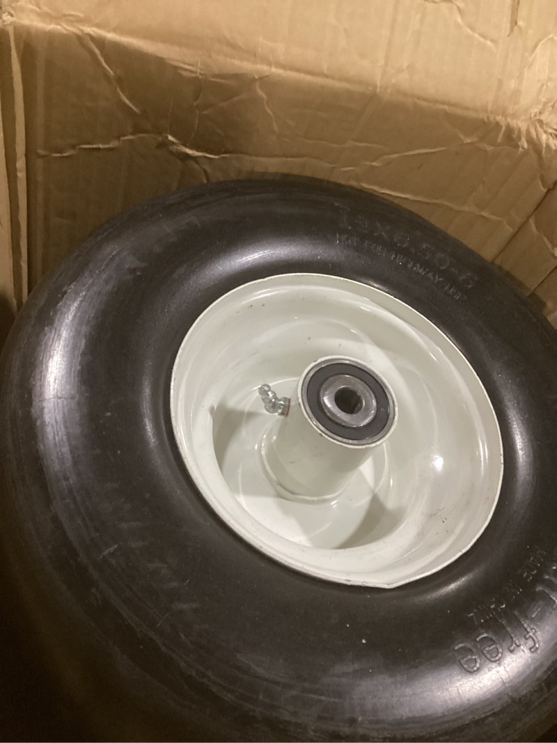 Condition photo showing As Is for 13x6.50-6 flat free lawn mower tires and wheels 3/4" 5/8" 1/2" ball bearings, 13x6.5x6 zero turn mower front tires, smooth tires for commercial grade lawn 5.5"-7.5" adjustable centered hub 13x6.50-6 - 2p ( flat free ) white