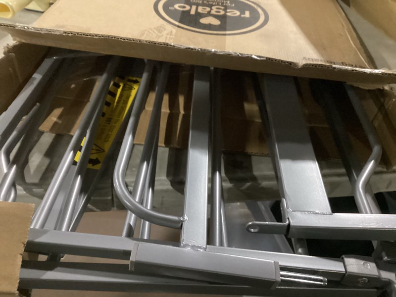 Condition photo showing As Is for regalo easy step 49-inch extra wide baby gate, includes 4-inch and 12-inch extension kit, 4 pack of pressure mount kit and 4 pack of wall mount kit, platinum platinum 29-49"w x 30"h