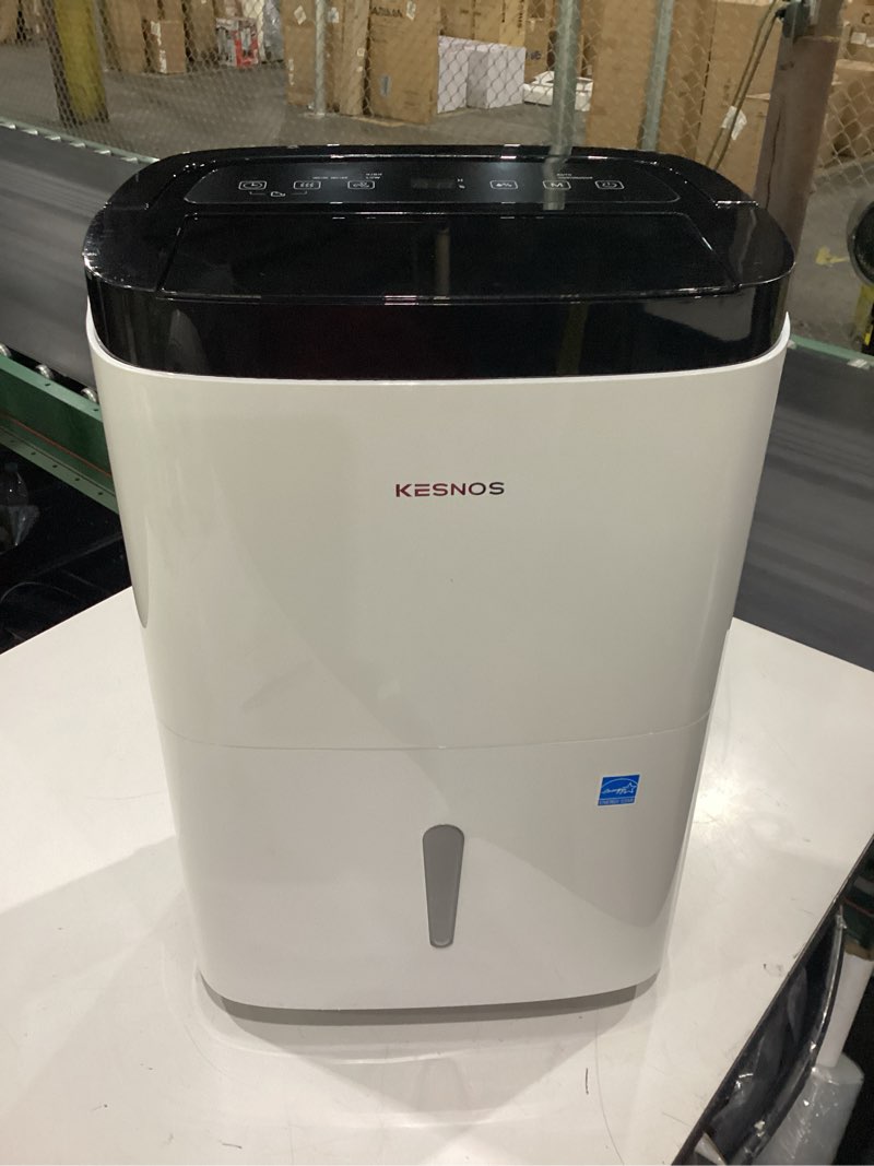 Condition photo showing As Is for **not tested**  kesnos 80 pints 2025 energy star dehumidifier for home & basement with drain hose, ideal for large spaces up to 5,500 sq. ft., featuring auto defrost & self-drying function 5,500 sq. ft. 80 pints