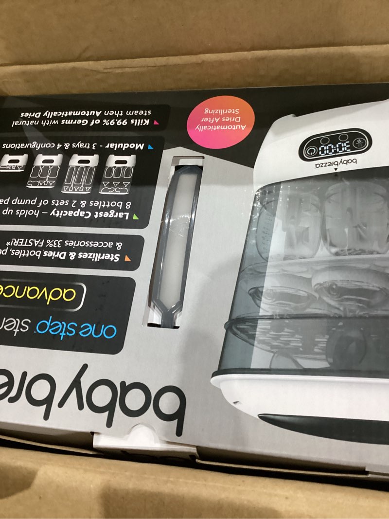 Condition photo showing As Is for Baby Brezza Bottle Sterilizer and Dryer Advanced – 33% Faster - Largest Capacity Steam Sanitizer - Universal Sterilization Machine for All Bottles + Pump Parts - HEPA Air Filter White