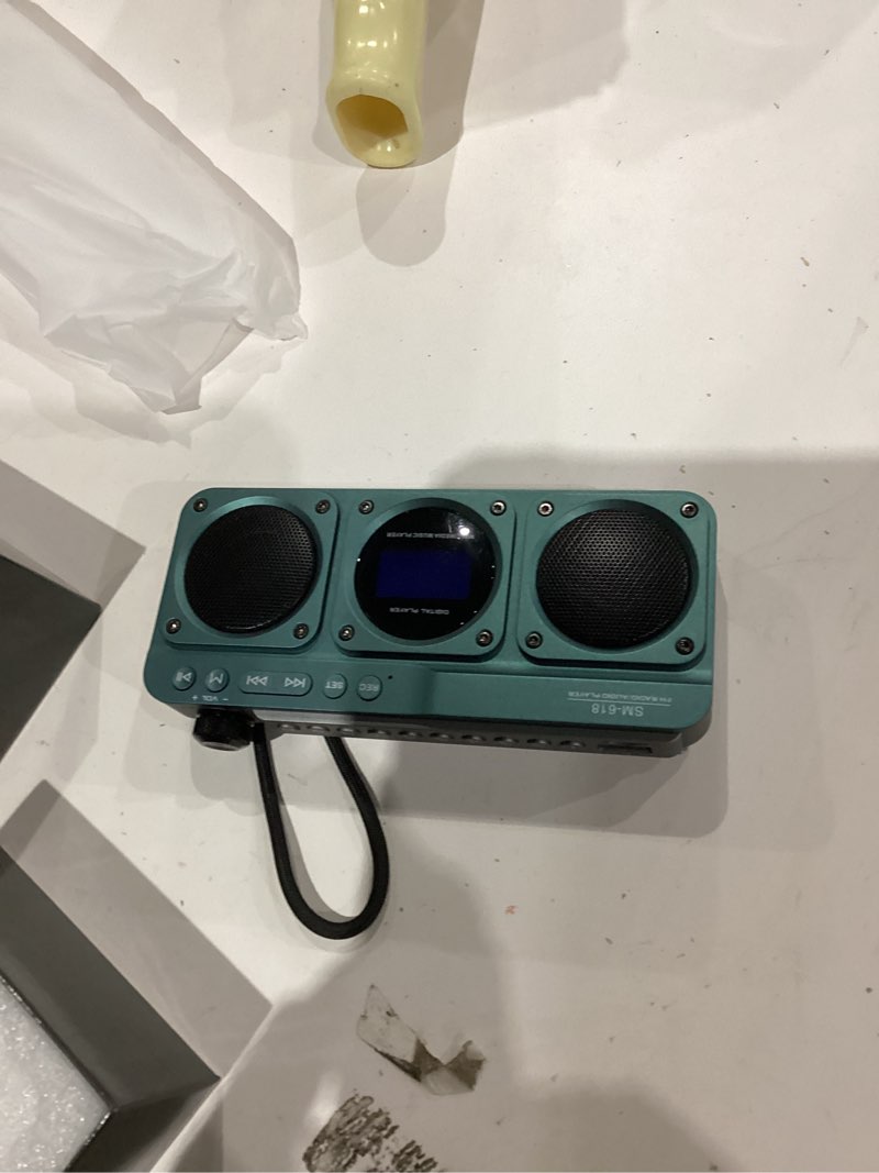 Condition photo showing As Is for Small Digital FM Radio Bluetooth Speaker, Handheld Rechargeable Radio Wireless Speaker, LCD Display, Double Speakers, Headphone Jack, Support USB/Micro SD Card MP3 Play for Home Outdoor (No AM)