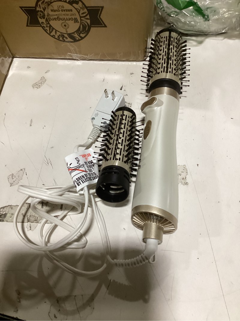 Condition photo showing As Is for 3 in 1 rotating hair dryer brush,