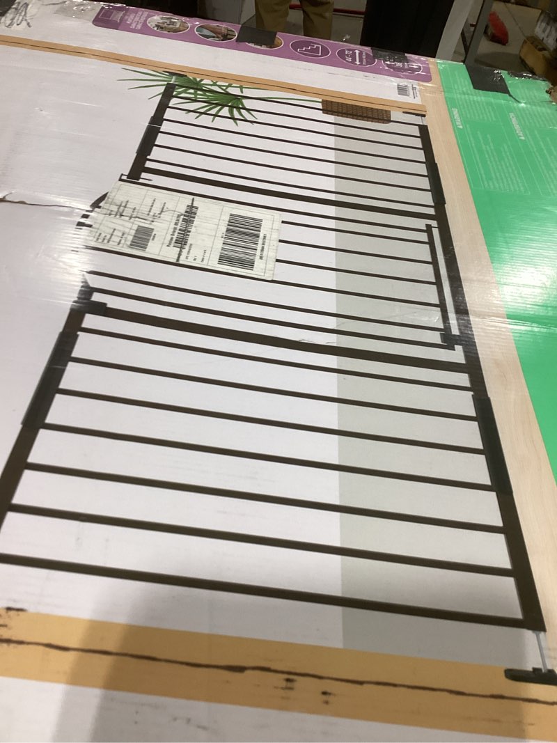 Condition photo showing Good Condition for Ingenuity Decorative Extra Wide Baby Gate & Dog Gate, 44"-72" Wide, 36" Tall, Hardware or Pressure Mounted, Install in Hallways, Bottom of Stairs, or Large Openings - Bronze