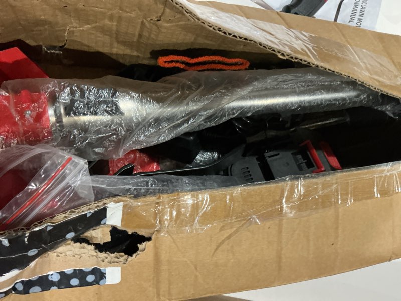 Condition photo showing As Is for lithium electric lawn mower multifunctional household handheld charging for trimming lawn and garden branches
