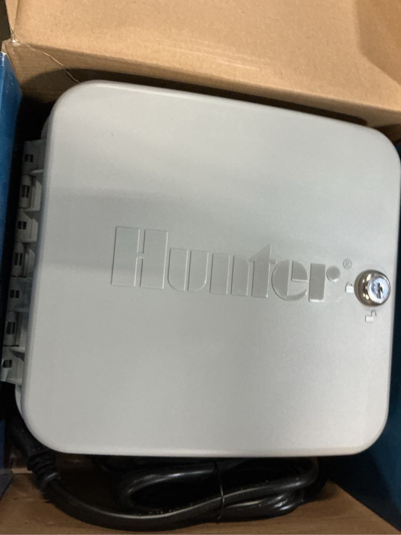Condition photo showing As Is for hunter hydrawise hpc400 smart wifi irrigation controller for lawns and gardens, 4 zone, expandable to 16 zones, weather based, app controlled sprinkler system