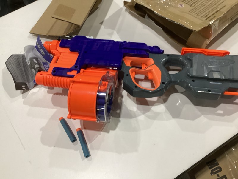 Condition photo showing As Is for nerf hyperfire motorized elite blaster, 25-dart drum, fires up to 5 darts per second, includes 25 official elite darts (amazon exclusive)