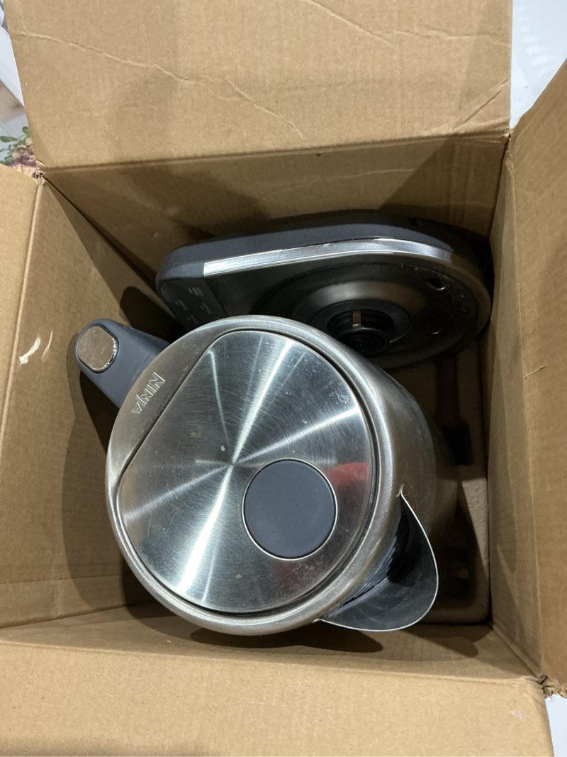 Condition photo showing As Is for ninja kt200 precision temperature electric kettle, 1500 watts, bpa free, stainless, 7-cup capacity, hold temp setting, silver