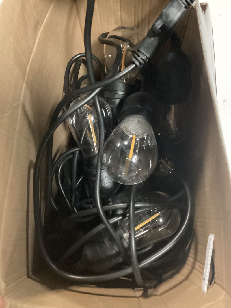 Condition photo showing As Is for harbor breeze 48-ft solar black indoor/outdoor string light with 20 white -light led edison bulbs