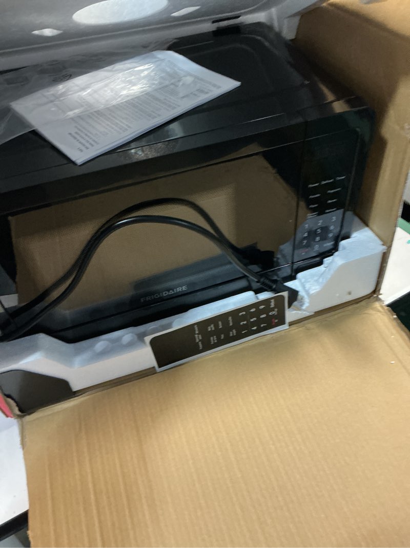 Condition photo showing Good Condition for FRIGIDAIRE EMW733BLACKAMZ 0.7 Cu. Ft. Microwave, Black