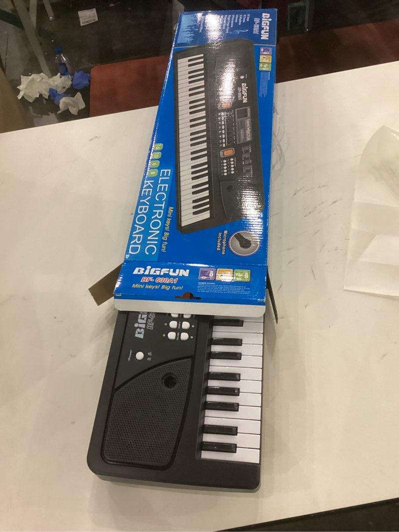 Condition photo showing New/Like New for Raimy Piano Keyboard for Beginners, 61 Keys Portable Electronic Digital Piano with Microphone, Learning Educational Music Keyboard Piano for Kids Gifts Toys for Boys Girls Toddlers (Black)