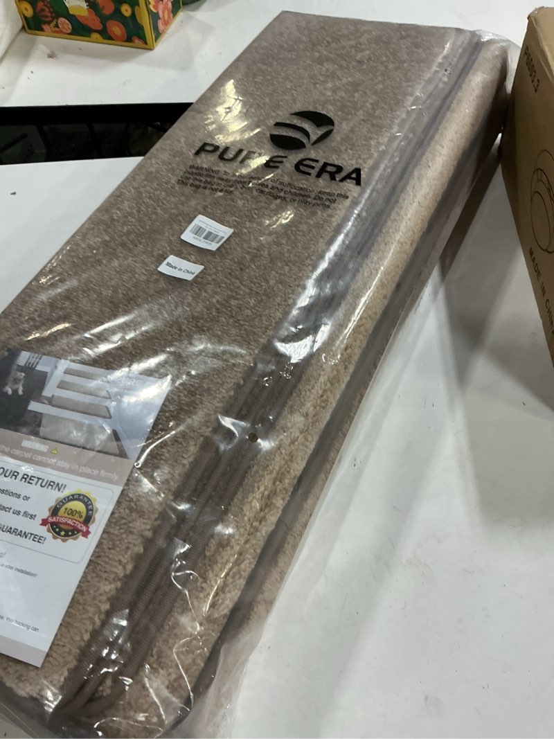 Condition photo showing New/Like New for PURE ERA Bullnose Carpet Stair Treads Set Tape Free Non-Slip Indoor Stair Protectors Pet Friendly Rugs Covers Soft Skid Resistant Washable Reusable 9.5" x 30"(14 Pieces, Camel Brown) Camel Brown 14 Pieces with Bullnose