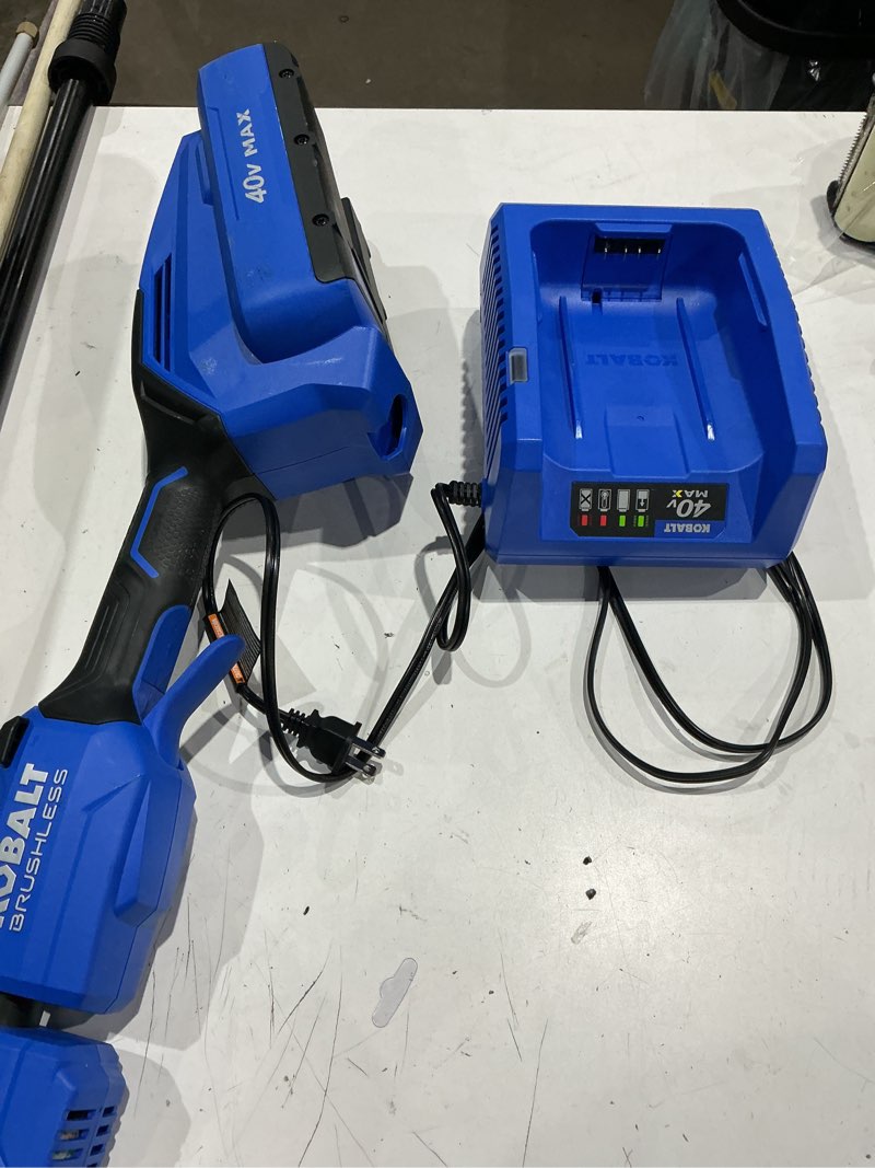 Condition photo showing As Is for kobalt gen4 40-volt 15-in straight shaft attachment capable battery string trimmer edger conversion capable 4.0 ah (battery included) (charger included)