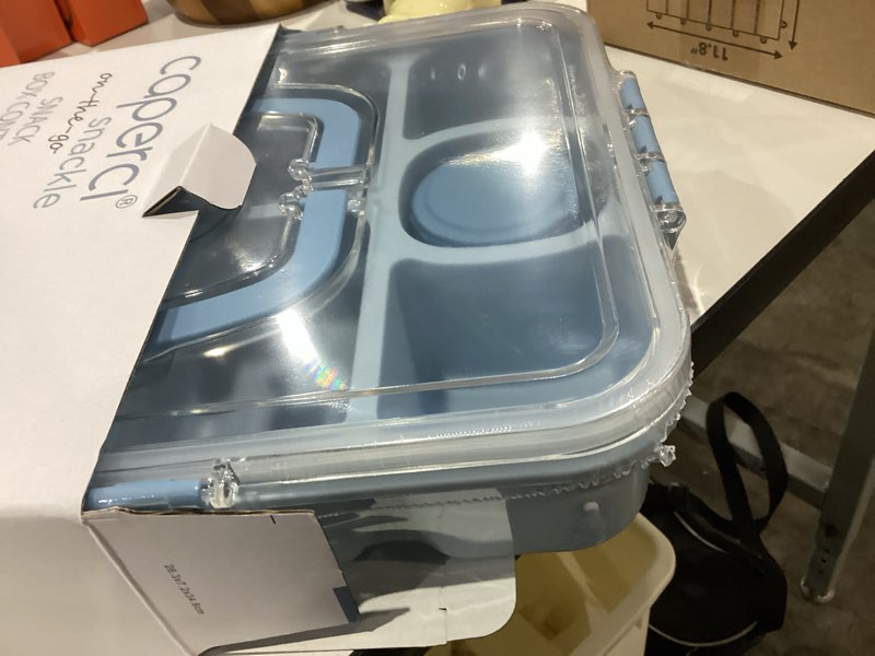 Condition photo showing New/Like New for Caperci Original Snackle Box Container - 10-Compartment Divided Snack Serving Tray with Lid & Handle, Built-in 2 Dressing Containers, Leak-Proof, Dishwasher Safe, BPA-Free (Sky Blue)