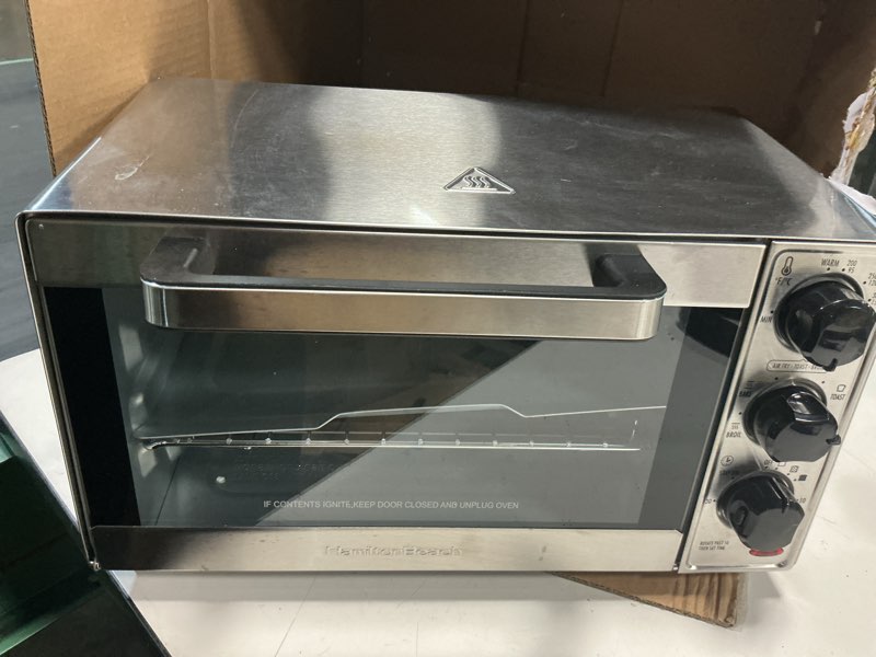 Condition photo showing As Is for hamilton beach sure-crisp air fryer toaster oven combo, fits 9” pizza, 4 slice capacity, powerful circulation, auto shutoff, stainless steel (31403)