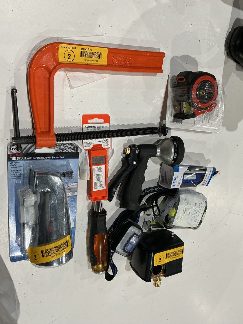 Condition photo showing As Is for assorted home improvement lot (small tools, screw, home accessories, etc.)