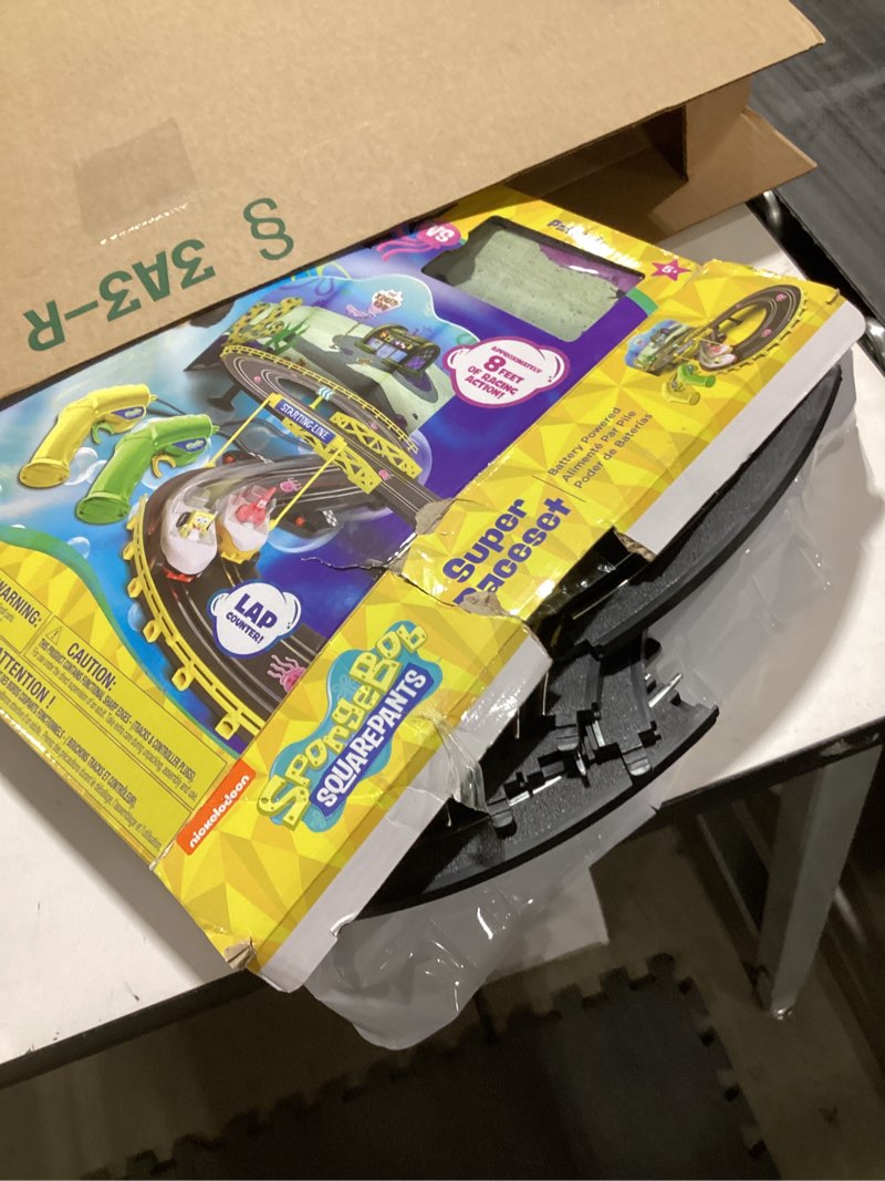 Condition photo showing As Is for NKOK SpongeBob Hot Rod Boat Slot Car Race Set 2531, Contains 8 Feet of Track, Dual Players, Great Item for Kids to Play with, Features a Lap Counter, Ages 6 and up